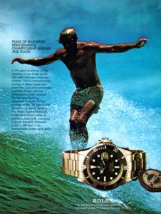 A vintage Rolex Submariner ref. 1680 ad, circa 1970s, is shown, with a man surfing and the timepiece highlighted in the bottom right quadrant. 