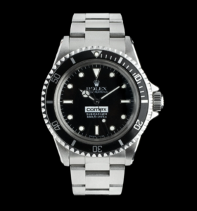 The Rolex Comex with a black dial and bezel shown. 