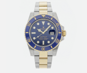 Rolex Bluesy Submariner shown with a blue dial and bezel, as well as gold and silver two-tone bracelet.