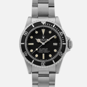 The Rolex 1665 Great White, or rather the Sea-Dweller, is shown with a black bezel and dial, with all white lettering, hence the name. 
