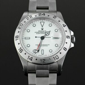 The Explorer II "Polar" is shown with a black backdrop. This watch is all white, save for the Rolex logo and name. 